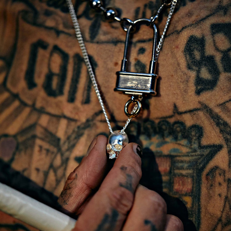 Buster and Punch Skull Pendant by Travis Barker | Panik Design