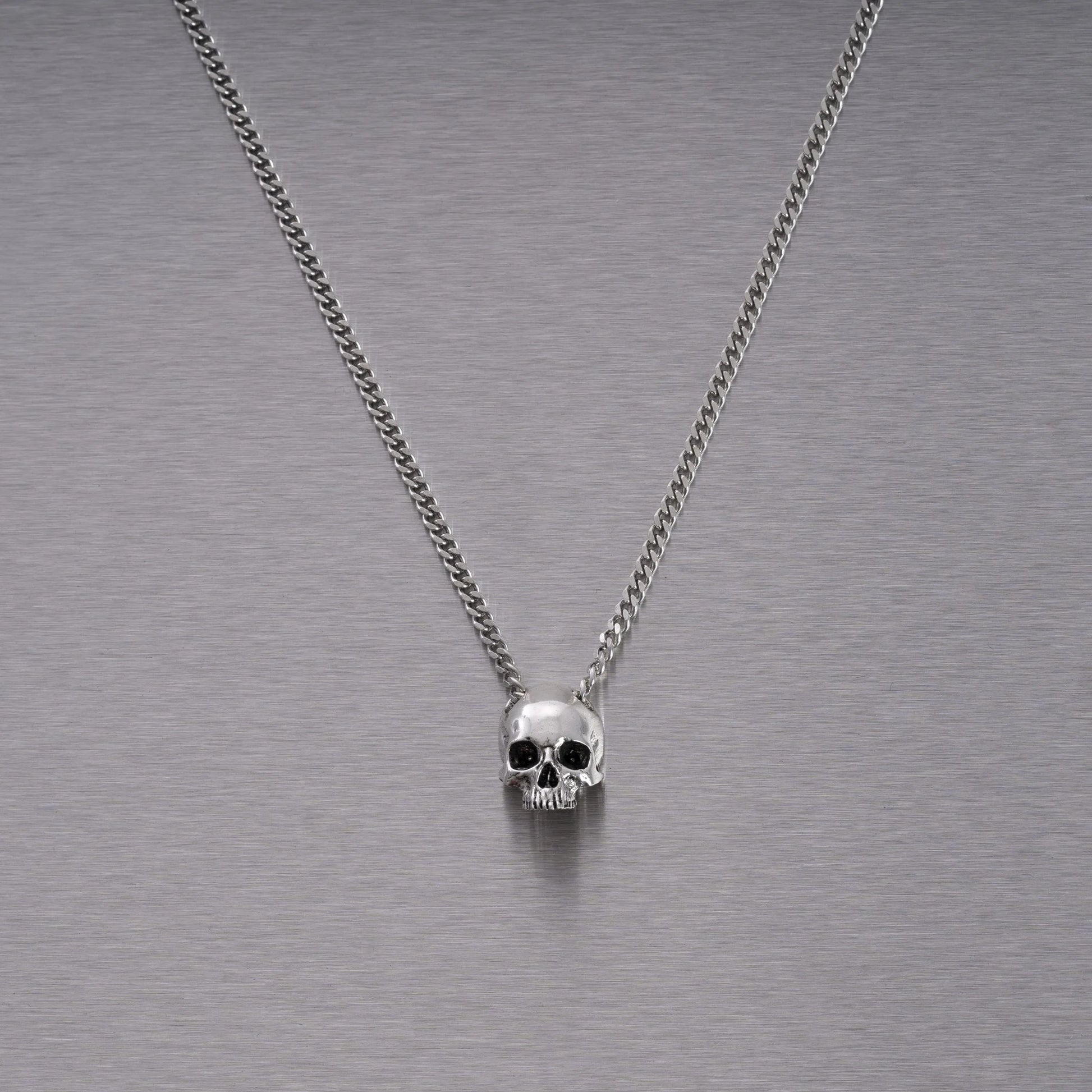 Buster and Punch Skull Pendant by Travis Barker | Panik Design