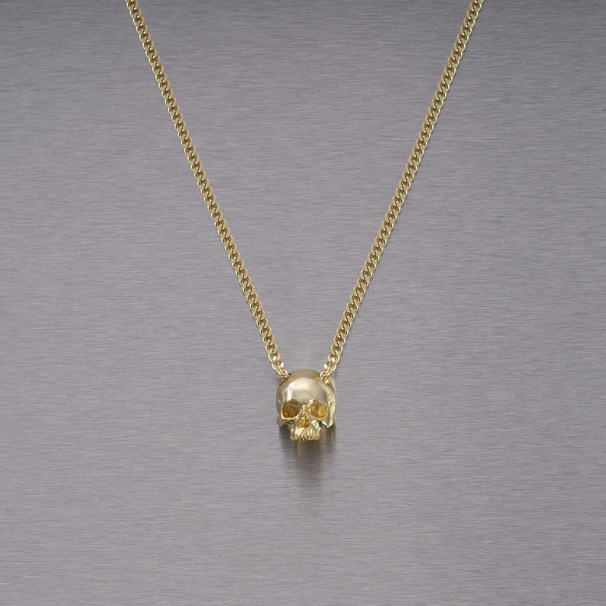 Buster and Punch Skull Pendant by Travis Barker | Panik Design