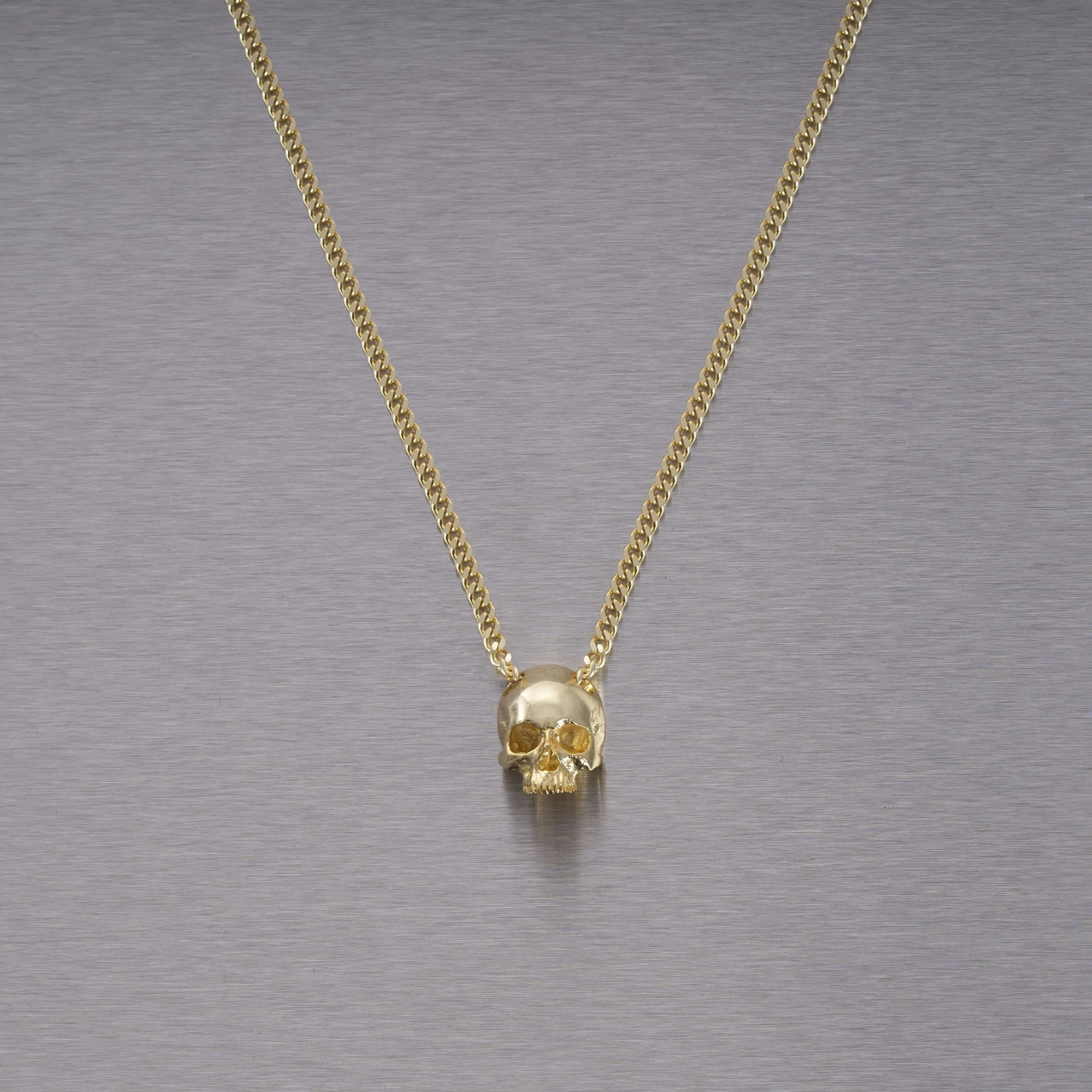 Buster and Punch Skull Pendant by Travis Barker | Panik Design